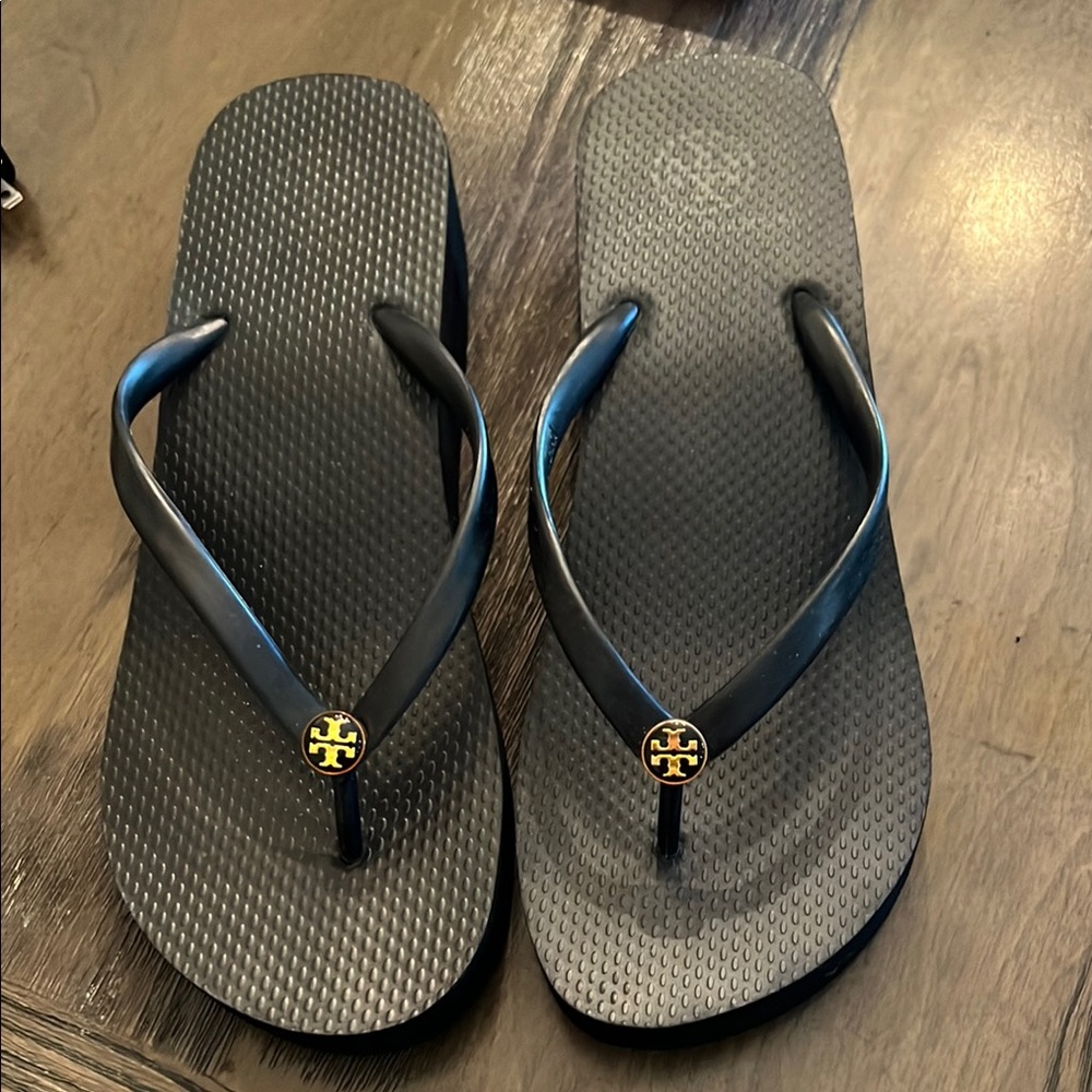 Tory Burch Black and Gold women’s Flip Flops